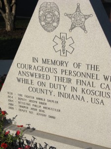 The names of five local heroes who died in the line of duty are forever etched in a memorial in Warsaw's Central Park. The names include Warsaw Fire Fighter Harold Shepler, KCSD Deputy Joseph Bauer, KCSD Detective Phillip Hochstetler, Indiana State Police Trooper Jason Beal, and KCSD Deputy Sgt. Jeffery Shaw. (Photo by Stacey Page)