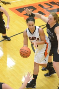 Jennifer Walker-Crawford makes a sweet pass to a teammate Thursday night for Warsaw.