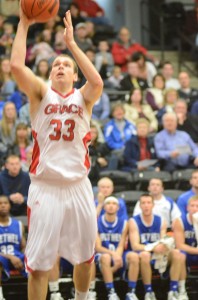 Junior Greg Miller goes up for two of his game-high 28 points for the Lancers Thursday night.