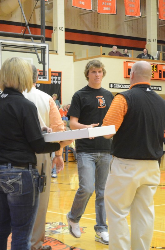 WCHS senior Michael Yantz receives his state runner-up ring Friday night. Yantz was the goalie for the Class 2-A state runner-up Tigers.