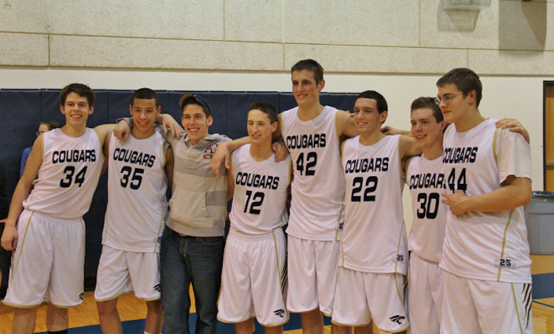 The senior members of the Lakeland Christian Academy boys basketball team are all smiles Tuesday night. The Cougars defeated Community Baptist of South Bend 79-44 on Senior Night at LCA (Photo provided by Scott Silveus)