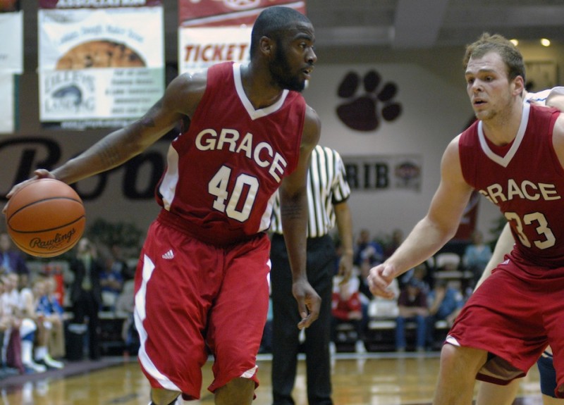 Grace College sophomore Karl Columbus looks for room to operate Saturday night. The former South Bend Riley standout had 18 points as the Lancers won to advance to the Final Four of the NAIA National Championships (Photo provided by Grace College Sports Information Department)