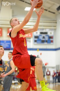 Triton star Clay Yeo flies in for two of his 23 points Monday night in All-Star action at Bethel College.