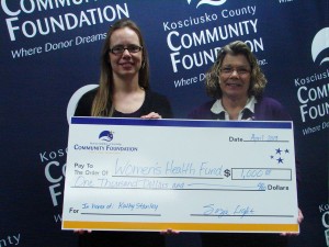 (Left to right): Stephanie Overbey, Kosciusko County Community Foundation, presents a grant to the Women’s Health Fund in honor of Kathy Stanley. (photo provided)