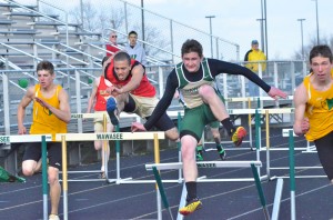 Clayton Cook of Wawasee looks to make ground in the 110 high hurdles.