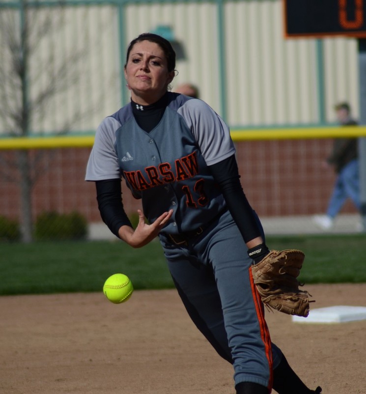 Kaleigh Speicher delivers a pitch for Warsaw Monday. Speicher belted a two-run homer in addition to notching the pitching win versus NorthWood.