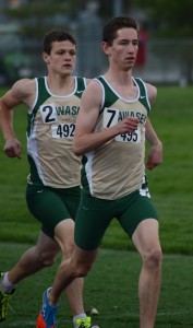 Wawasee teammates Adam Doll and Zach Cockrill compete in the 1,600 Tuesday night.