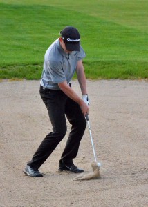 Warsaw's Jon Schram looks for higher ground.