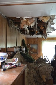 The living room ceiling in the home at 1405 Ranch Rd., Warsaw, has caved in rending the home uninhabitable. (Photos by Stacey Page)