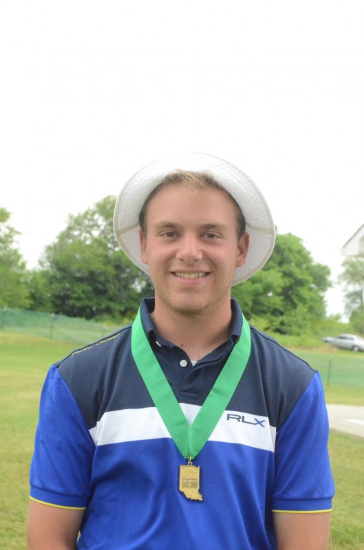 Ryan Rapp of Triton is all smiles as he proudly displays his medal after placing fifth at the State Finals in Franklin Wednesday. 