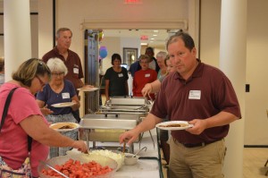 Mary Cox and John Schlagenhauf getting breakfast at last years WPOA/SLA Family Breakfast