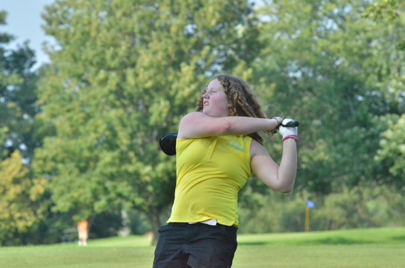 Wawasee's Madison Beaman smashes a drive Monday night against Manchester. 