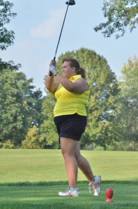 Megan Goralczyk checks out her drive on number nine. (Photos by Nick Goralczyk)