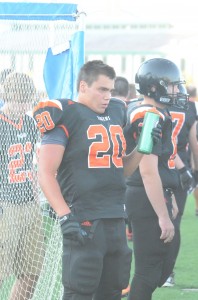 Tristan McClone takes a break Friday night. The Warsaw senior rushed for 217 yards in a season-opening win (Photo by Scott Davidson)