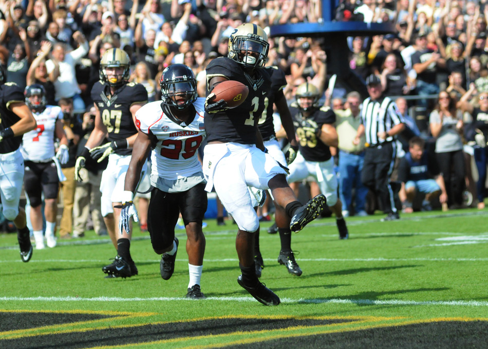 Purdue running back Akeem Hunt crosses the goal line for Purdue's first touchdown of the game.