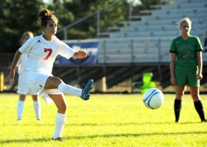 Bridgette Thomson sends her penalty kick towards net against Bremen.