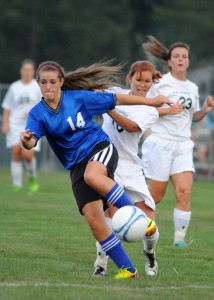 Whitko's Heather Bryan and Wawasee's Natalie Jones tangle up during play.