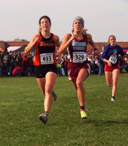 Senior Madeline Hooks sprints for the finish line for Warsaw Saturday.