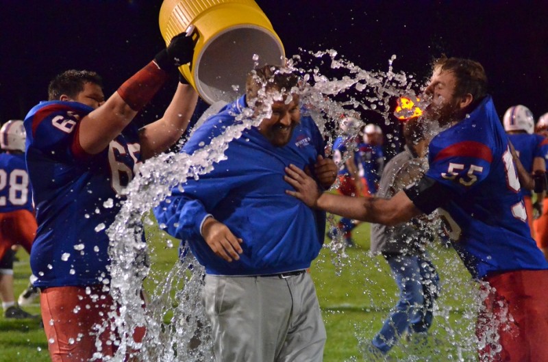 First-year Whitko head coach Josh Mohr earns a treatment that every coach dreams of: The Gatorade bath. (Photos by Nick Goralczyk)