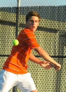 Senior Evan Miller rolled to a win at No. 3 singles Tuesday as Warsaw beat Culver Academies 3-2 in a regional semifinal (File photos by Mike Deak)