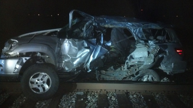 An SUV that was reported stolen was struck by a CSX train near Syracuse late Sunday. (Photo provided by Shawn Kitson)