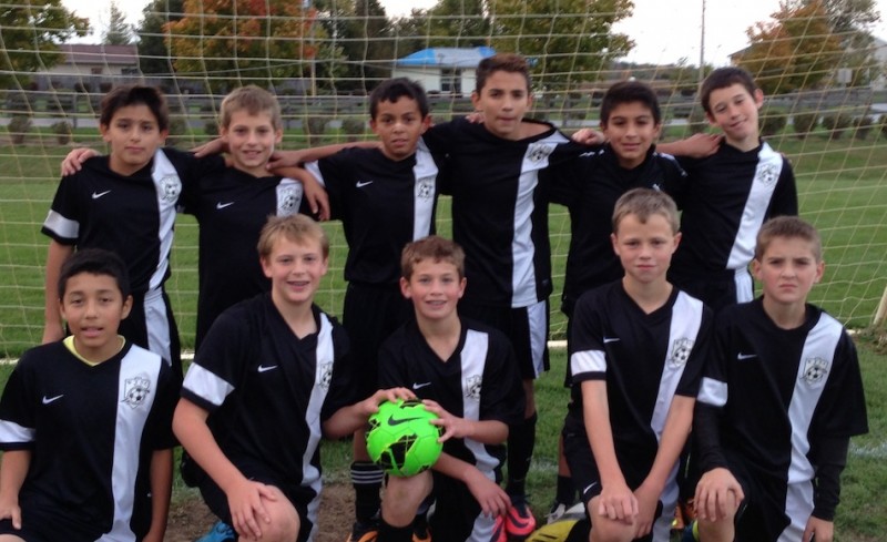 The Warsaw Travel '02 U12 soccer team shown above finished its fall season undefeated (Photo provided by Shirley Fleming)