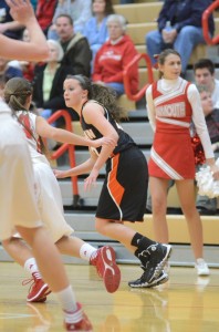 Senior Eryn Leek looks for room to operate against the Pilgrims.