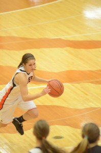 Kilee Slone heads for the hoop for the Tigers.