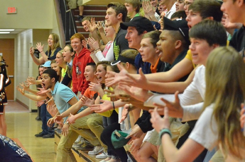 Warsaw students react in response to Snider head coach Tony Sumpter as the cheer block mocked his every move during the third quarter of Saturday's game. (Photos by Nick Goralczyk)