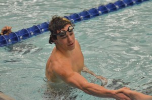 Warsaw's Spencer Davidson shakes the hand of a competitor following one of his races on Thursday. 