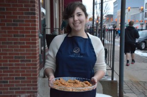 Latte provided guests passing by with cookie samples during March's First Friday event.  (Photo by Alyssa Richardson)