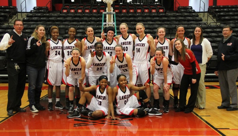 The Grace College women's basketball team is all smiles after winning the NCCA Midwest Regional Championship Thursday night.