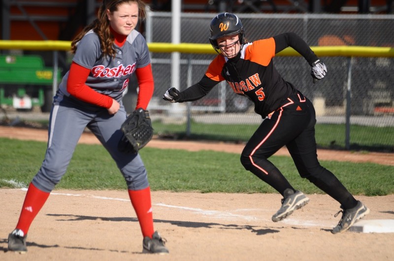 Whitney Sleeth breaks from first for Warsaw versus Goshen. The senior had two hits and earned the pitching win in relief for the Tigers.