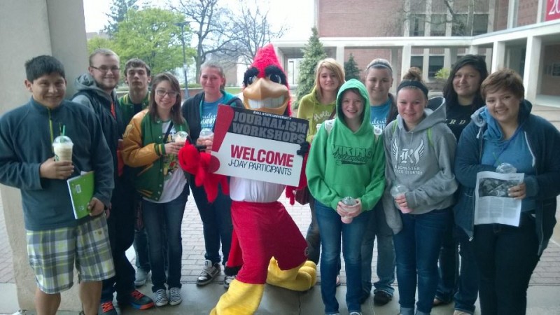 Left to Right – Cristian Jimenez Baca, Zac Capps, Michael Thacker, Jenna Schultz, Kaytie Shilling, Charlie Cardinal, Catherine Leadford, Morgan Thomas, Josie Forney, Jada Gaff, Makayla Ruiz, and Brandi Hazard Caption -- Students who attended the 59th Annual BSU Journalism Day workshops pose for a picture with Charlie cardinal, the Ball State University mascot. Students who attended the conference were able to attend three different 45 minute sessions in order to learn more and improve their skills in photography, writing, interviewing, and other areas of journalism. 