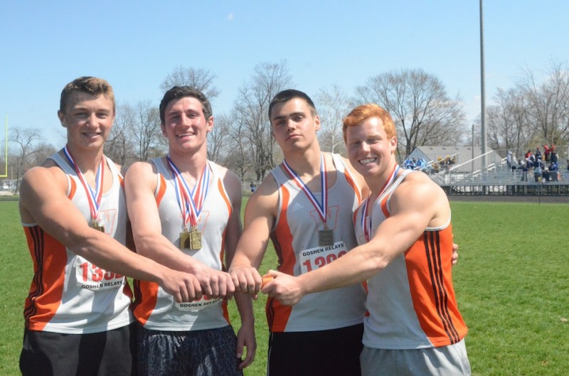 Warsaw's 4 X 100 relay team won a championship Saturday. From left are Mike Miller, Gabe Furnivall, Tristan McClone and Tanner Balazs.