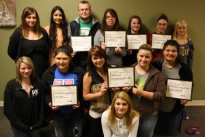 Back row (left to right) – Kaytie Shilling, Stephanie Mendez, Zac Capps, Brianna Willard, Jada Gaff, Jenna Schultz, Maci Jaberg Middle row (left to right)—Morgan Thomas, Makayla Ruiz, Cora Warstler, Josie Forney, Alyssa VanMeter Very front – Catherine Leadford Caption -- Members of the 2013-14 Student Publications staff pose for a photo with their awards. This was a record year both for the number of items the staff submitted to the BSU Journalism Day contests as well as the number of winners. This was the first year the Runic Review student newspaper, re-established in 2012, competed.