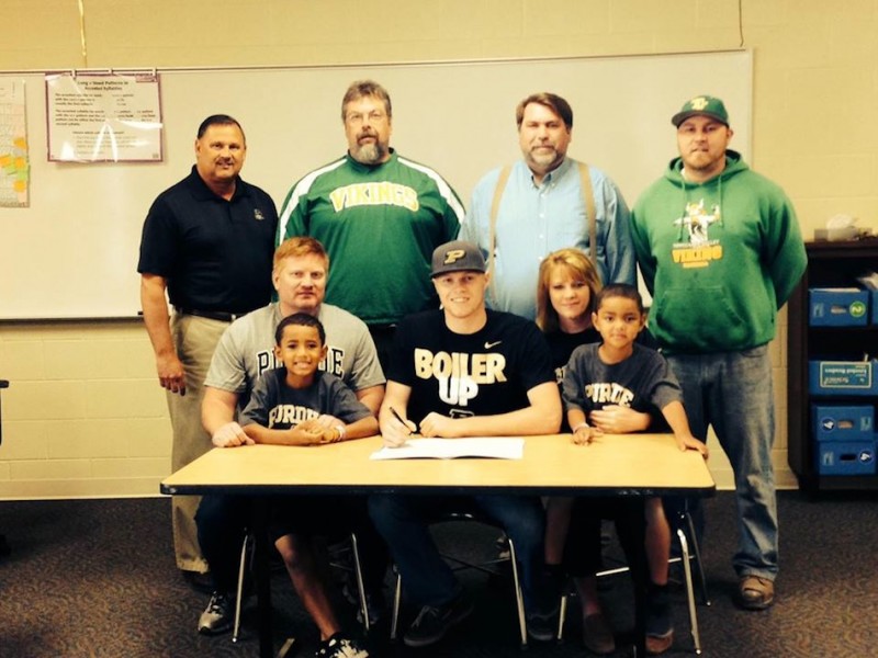 Tippecanoe Valley three-sport senior star Tanner Andrews signed to play baseball at Purdue on Monday. Andrews is shown above with his parents Todd and Margaret. In back are TVHS Athletic Director Duane Burkhart, TVHS football coach Jeff Shriver, TVHS principal Kirk Doehrmann and TVHS baseball coach Brandon Cody (Photo provided)