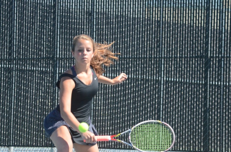 Sarah Boyle reaches for a return for sectional champion Warsaw Friday.