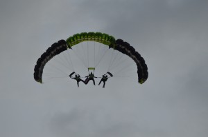 Among the aerial acrobatics was the tri-by-side with red smoke streaming from the heels of jumpers.