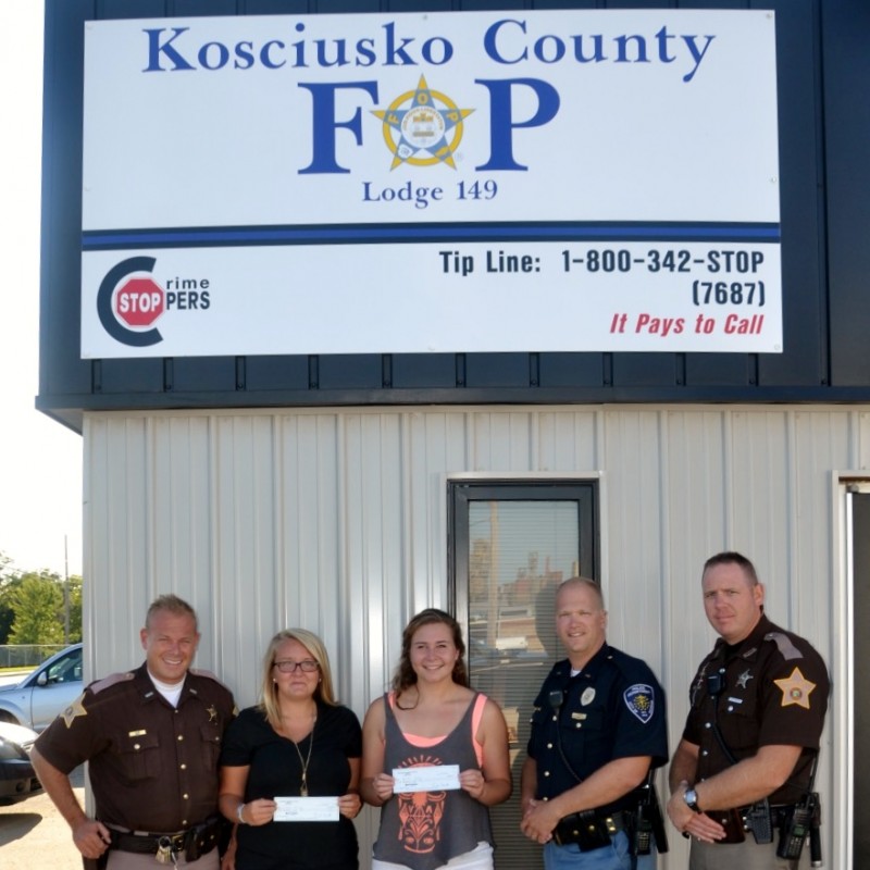 Pictured from left are Kosciusko County FOP President Lt. Chris McKeand, McCune, Ayres, FOP Chaplin Joel Beam and FOP Vice President Jim Smith. Cameron Shepherd was unavailable for the photo due to his participation on the Anderson University football team.