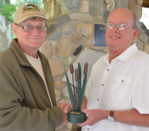 Roger Symensma received the 2014 Cattail Award at the WACF Annual Meeting. Sam Leman, board chairman, made the presentation. (Photo by Deb Patterson) 