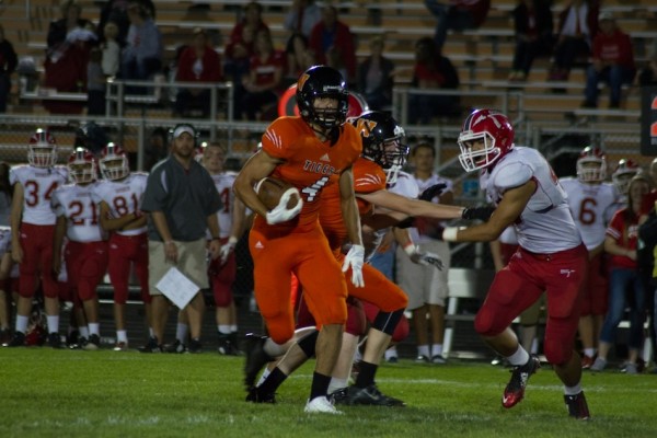Riley Rhoades is headed for a touchdown for Warsaw Friday night (Photos by Ansel Hygema)