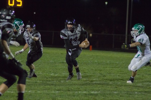 Warsaw quarterback Jake Mangas helped rally his team to victory Friday night (Photo by Ansel Hygema)