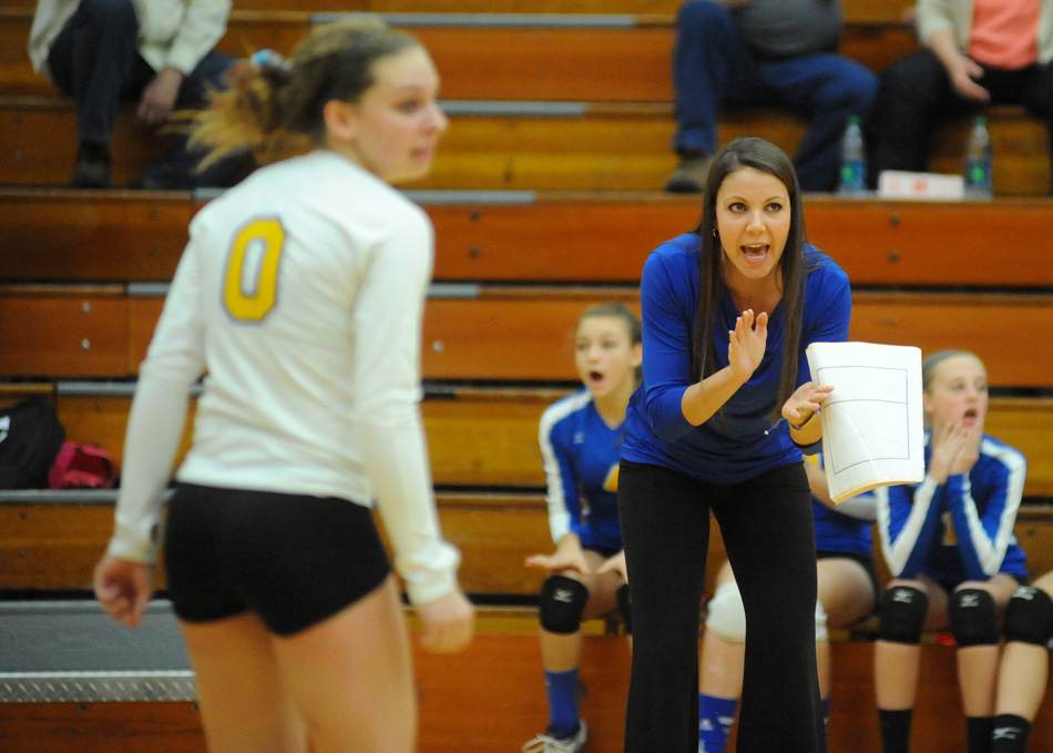 Triton head coach Samantha Willsey encourages Quinn Downing and the Lady Trojans against South Central.