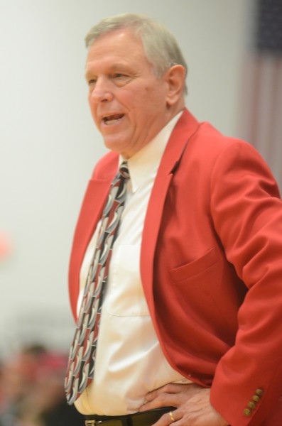 Jim Kessler instructs his team during his historic win Friday night at Grace College.