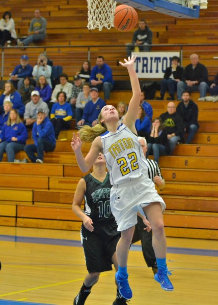 Kylie Mason lays in two for Triton during Saturday morning's win over Wawasee. (Photos by Nick Goralczyk)