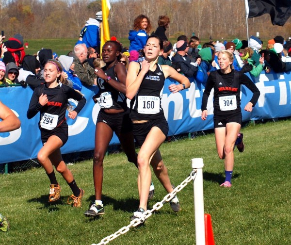 Mia Beckham and Brooke Rhodes of Warsaw near the finish line Saturday at the State Finals (Photo by Tim Creason)