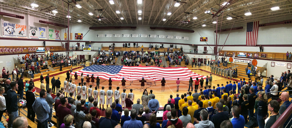 The Indiana National Guard performed the national anthem at Jimtown High School Friday night before the start of the Jimtown-Triton boys basketball game. (Photos by Mike Deak)