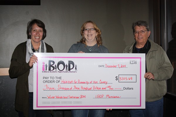 L to R: Lori Donahoe, Betty Swanson, iBOP secretary and David Kaufman, Habitat construction supervisor.