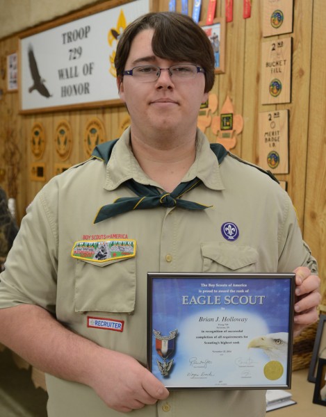 Brian Holloway holds his Eagle Scout Certificate. The Eagle Scout Award is the highest youth honor in Boy Scouts. (Photo by Deb Patterson)
